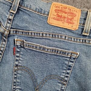 Levis Classic Relaxed Boot Cut 550 Jeans Womens 12M Light Wash Mid Rise Y2K